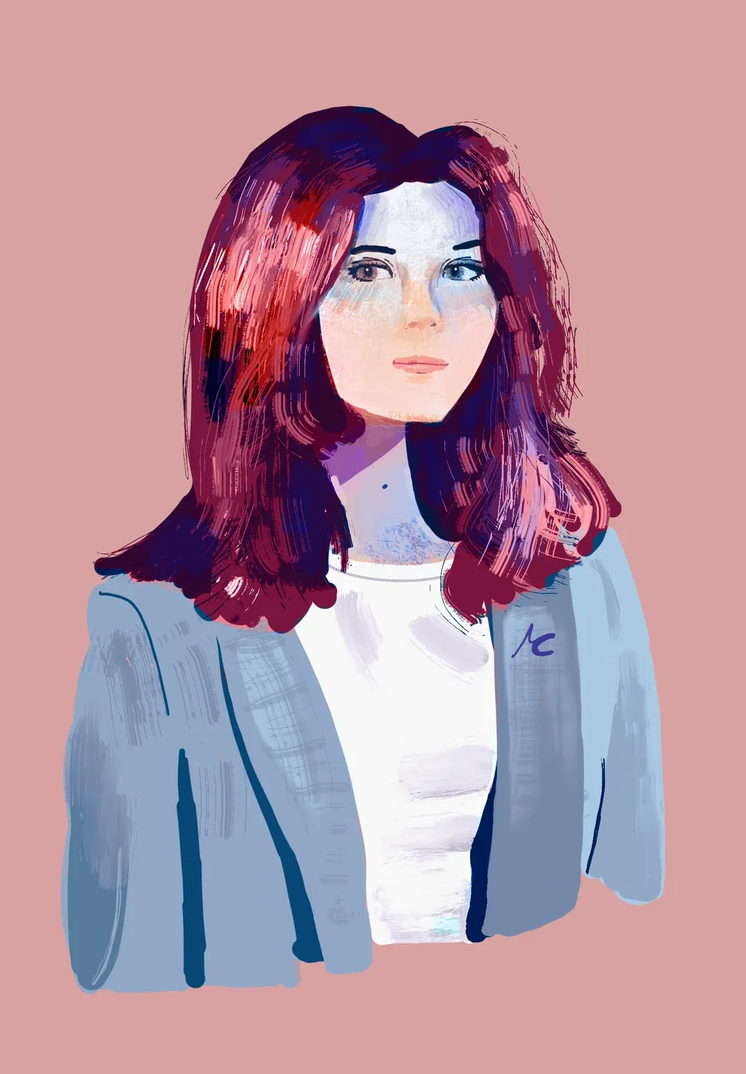 Portrait of a red-haired woman in a light blue blazer on a pink background